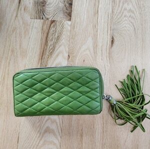 Tumi wallet color green soft leather
